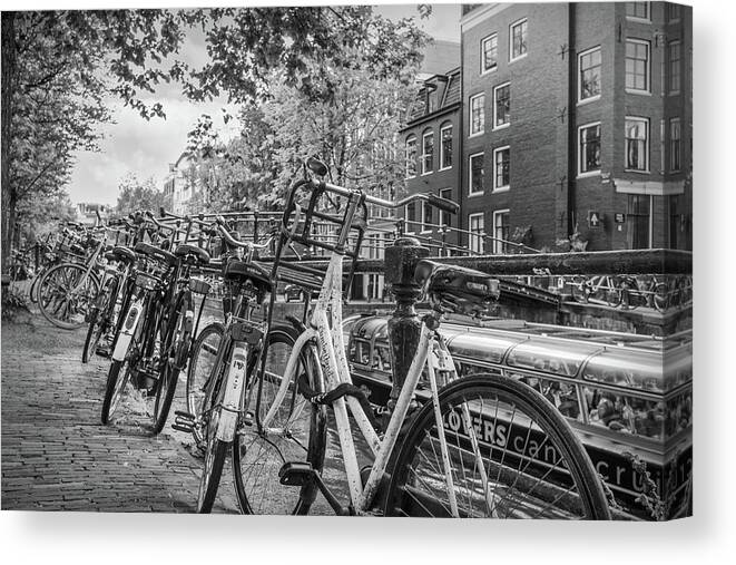 Boats Canvas Print featuring the photograph Bicycles of Every Type in Amsterdam by Debra and Dave Vanderlaan