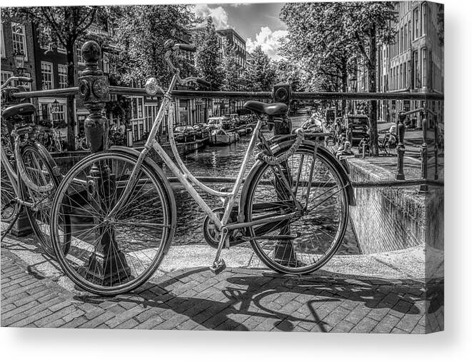 Boats Canvas Print featuring the photograph Bicycles on the Canals in Black and White by Debra and Dave Vanderlaan