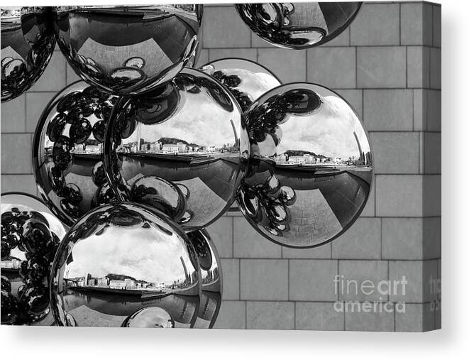 Abstract Canvas Print featuring the photograph Bilbao Reflected in Shiny Balls Spain by James Brunker