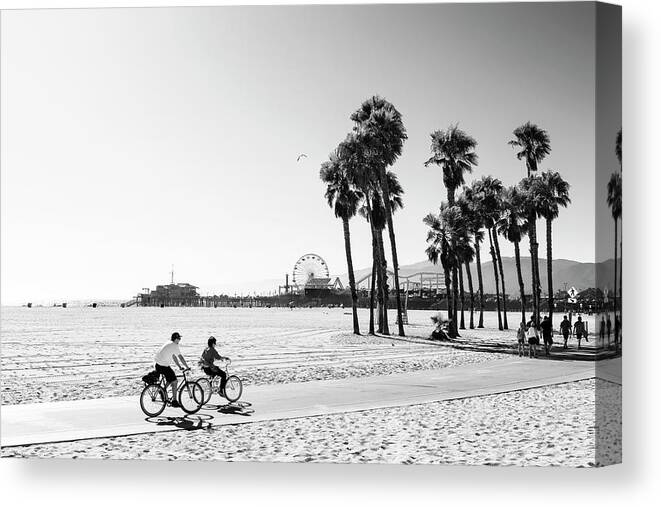 Santa Monica Canvas Print featuring the photograph Black California Series - Bike Ride in Santa Monica by Philippe HUGONNARD