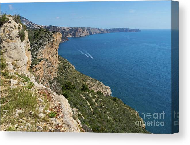 Mediterranean Sea Canvas Print featuring the photograph Blue Mediterranean Sea and limestone cliffs by Adriana Mueller