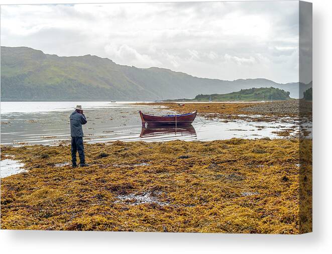 Scotland Canvas Print featuring the photograph Boat Seaweed and photographer in Isle of Skye, UK by Dubi Roman