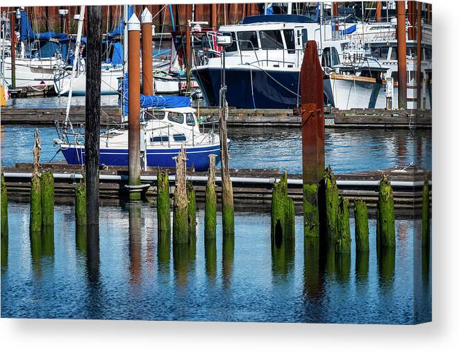 Afternoon Canvas Print featuring the photograph Boats and Old Pilings by Robert Potts