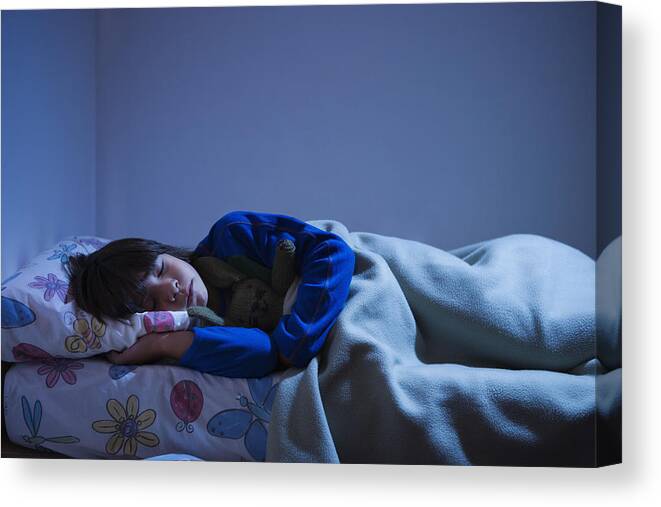 White People Canvas Print featuring the photograph Boy (8-10) sleeping in bed by Siri Stafford