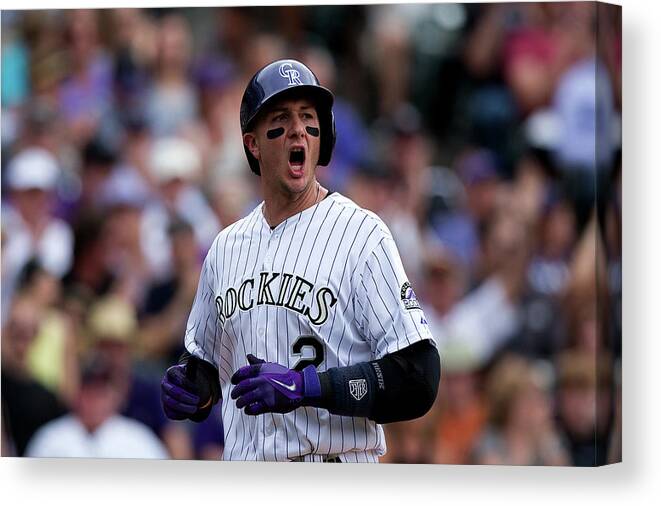 Scoring Canvas Print featuring the photograph Carlos Gonzalez and Troy Tulowitzki by Justin Edmonds