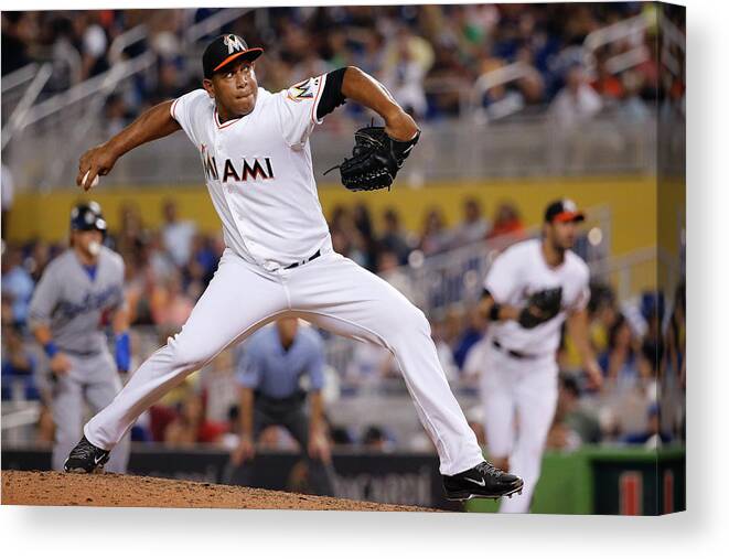Baseball Pitcher Canvas Print featuring the photograph Carlos Marmol by Rob Foldy