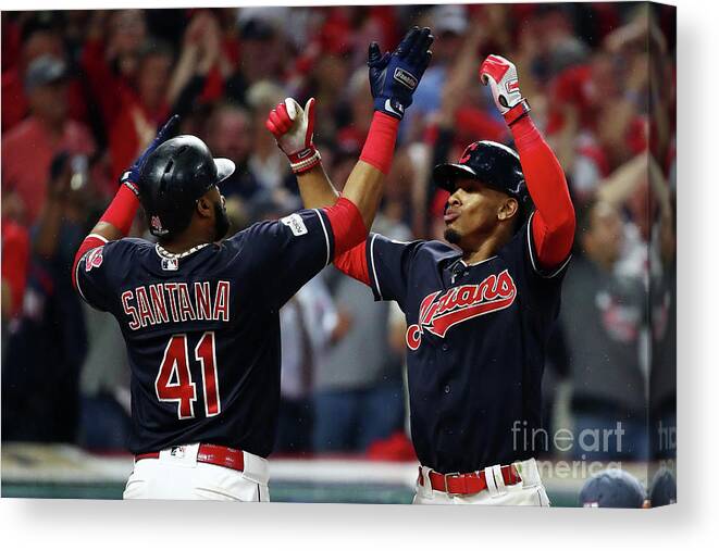 Game Two Canvas Print featuring the photograph Carlos Santana and Francisco Lindor by Gregory Shamus