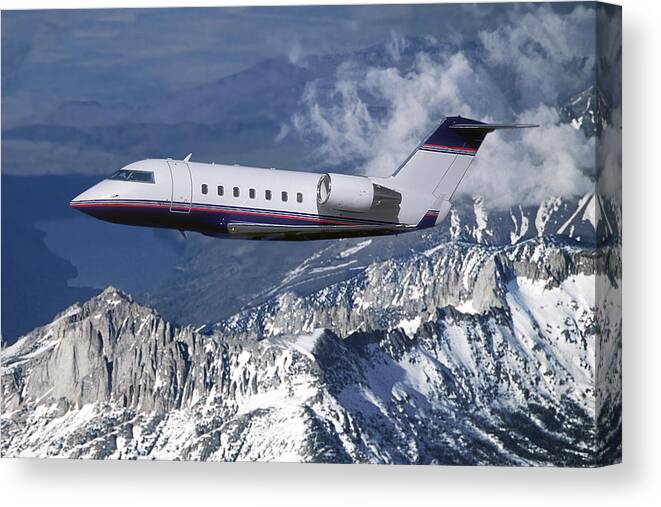 Challenger Business Jet Canvas Print featuring the mixed media Challenger Corporate Jet over Snowcapped Mountains by Erik Simonsen