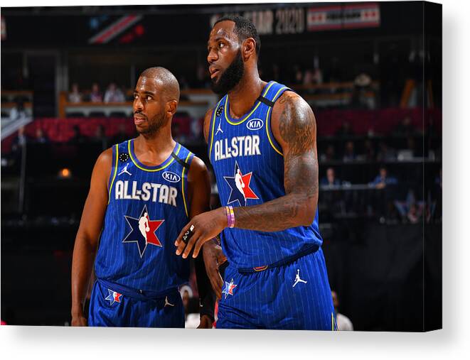 Nba Pro Basketball Canvas Print featuring the photograph Chris Paul and Lebron James by Jesse D. Garrabrant