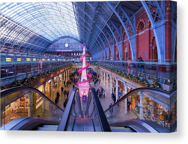 Kings Cross Canvas Print featuring the photograph Christmas at Kings Cross St Pancras Station by Andrew Lalchan
