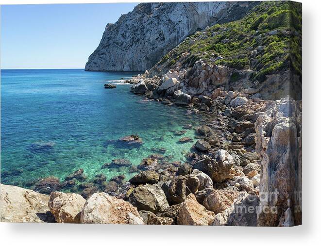 Mediterranean Coast Canvas Print featuring the photograph Turquoise sea water and cliffs by Adriana Mueller