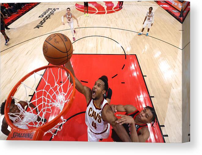 Evan Mobley Canvas Print featuring the photograph Cleveland Cavaliers v Toronto Raptors by Vaughn Ridley