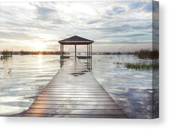 Boats Canvas Print featuring the photograph Cloud Reflections in Beachhouse Tones by Debra and Dave Vanderlaan