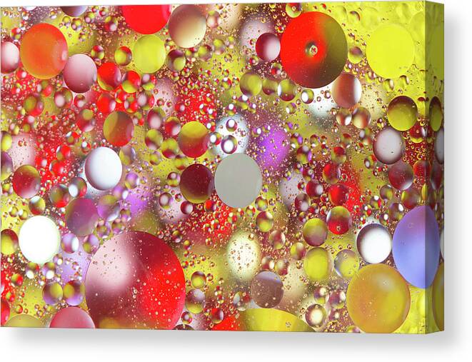 Abstract Canvas Print featuring the photograph Colorful Bubbles in Oily Water by Charles Floyd