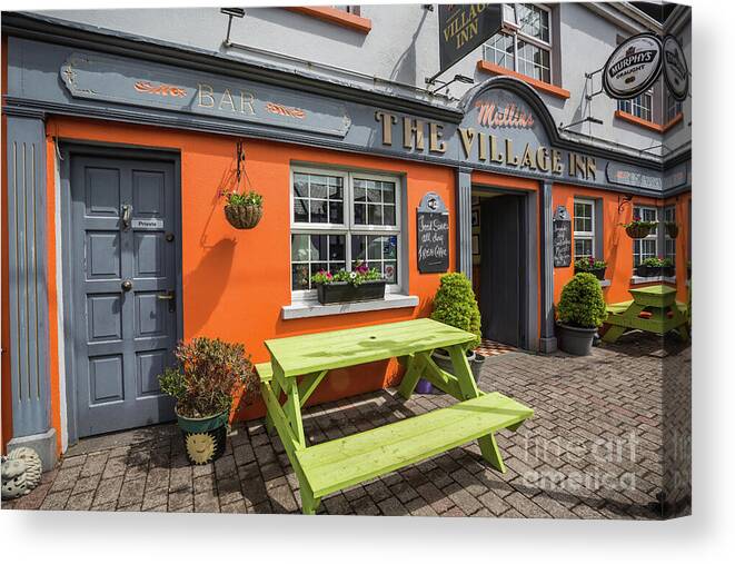 The Village Inn Canvas Print featuring the photograph Colorful Irish Pub by Eva Lechner