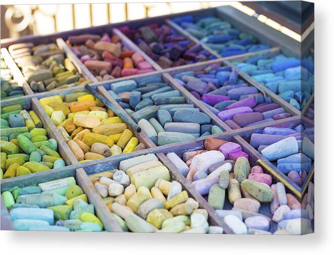 In A Row Canvas Print featuring the photograph Colorful pastels by Kelli Klymenko