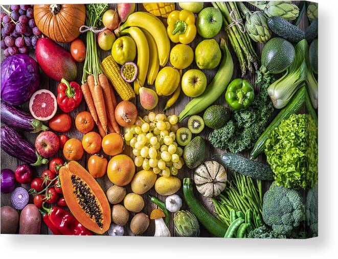 Broccoli Canvas Print featuring the photograph Colorful vegetables and fruits vegan food in rainbow colors by Mediterranean