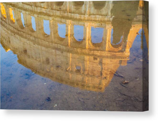 Roma Canvas Print featuring the photograph Colosseum reflection in water by Fabiano Di Paolo