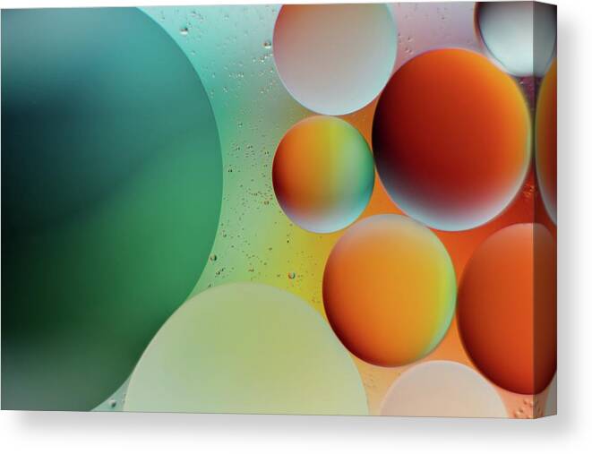 Texture Backgrounds Canvas Print featuring the photograph Colours of wonders - blue and white balloons on white surface by Julien