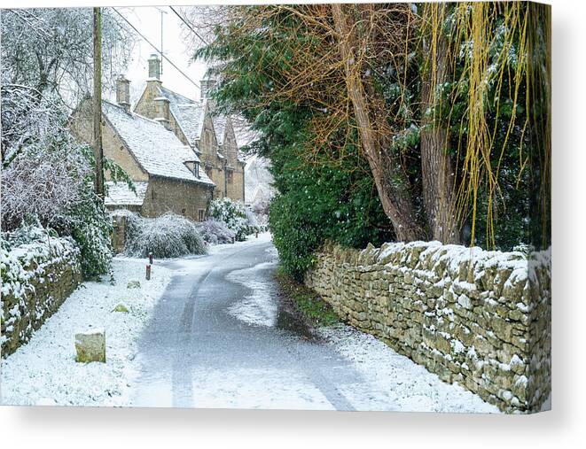 Taynton Canvas Print featuring the photograph Country Lane in Taynton in the Snow by Tim Gainey