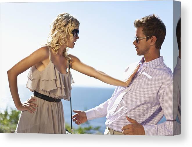 Problems Canvas Print featuring the photograph Couple arguing outdoors by Hybrid Images