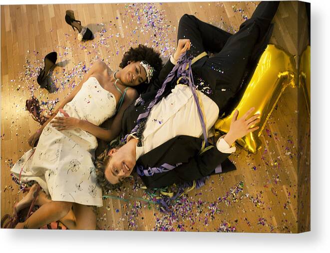 Crown Canvas Print featuring the photograph Couple lying down on the floor by Orbon Alija