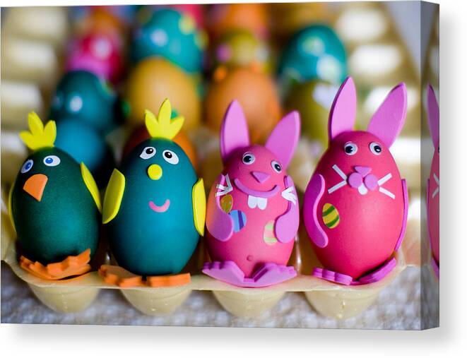 In A Row Canvas Print featuring the photograph Decorated Easter eggs by Jorja M. Vornheder