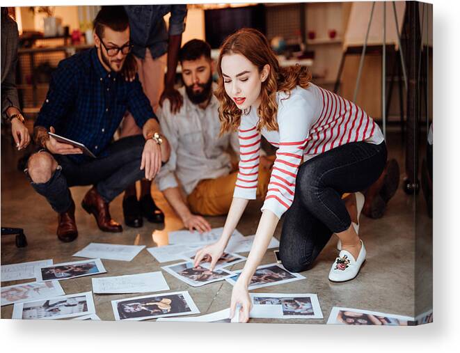 New Business Canvas Print featuring the photograph Design team planning for a new project by Anchiy