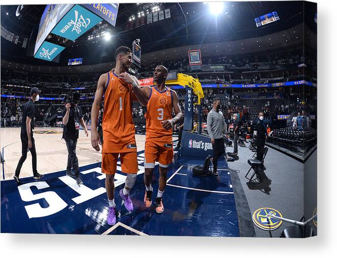 Devin Booker Canvas Print featuring the photograph Devin Booker and Chris Paul by Bart Young