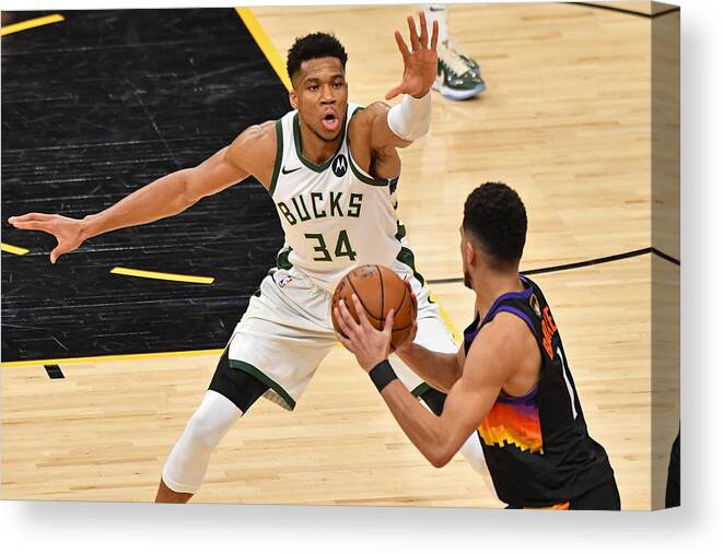 Playoffs Canvas Print featuring the photograph Devin Booker and Giannis Antetokounmpo by Jesse D. Garrabrant