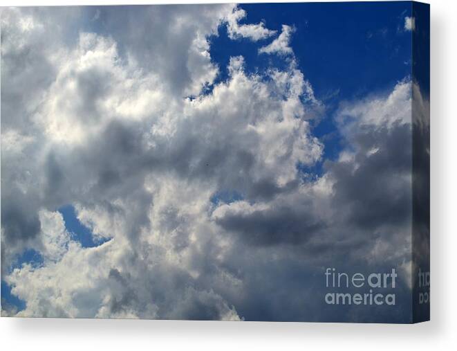 Cloud Photography Canvas Print featuring the photograph Dispersing Rain Clouds by Expressions By Stephanie