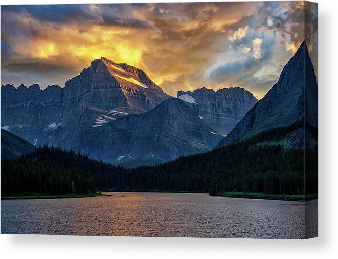 Swiftcurrent Lake Canvas Print featuring the photograph Drama at Dusk by Darlene Bushue