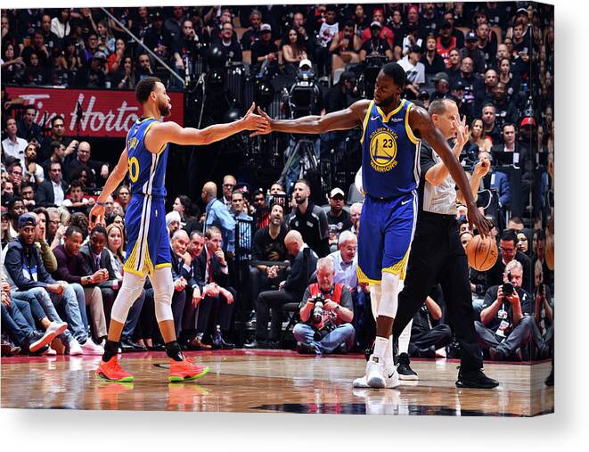 Stephen Curry Canvas Print featuring the photograph Draymond Green and Stephen Curry by Jesse D. Garrabrant