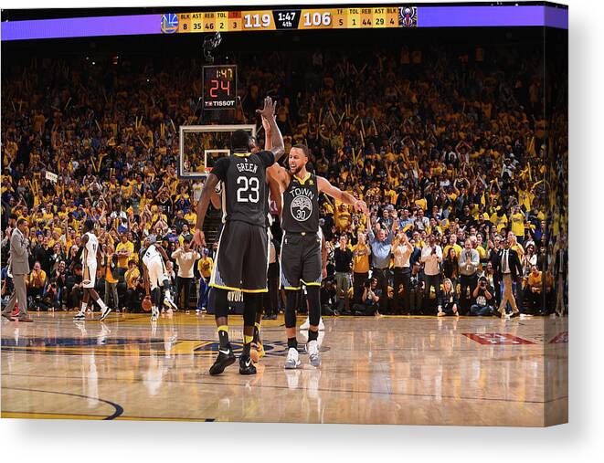 Draymond Green Canvas Print featuring the photograph Draymond Green and Stephen Curry by Noah Graham