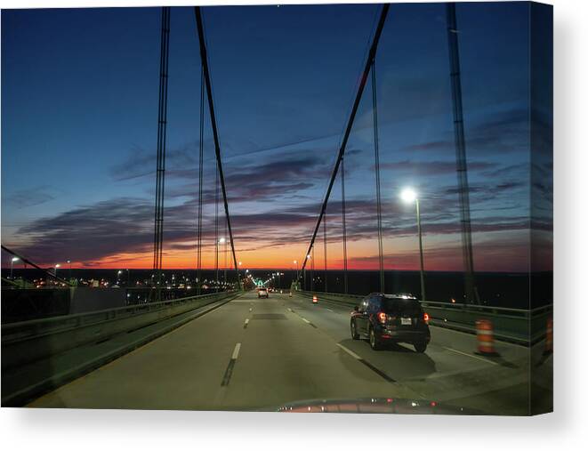 Driving Canvas Print featuring the photograph Driving Over A Bridge Early Morning At Sunriseac by Alex Grichenko