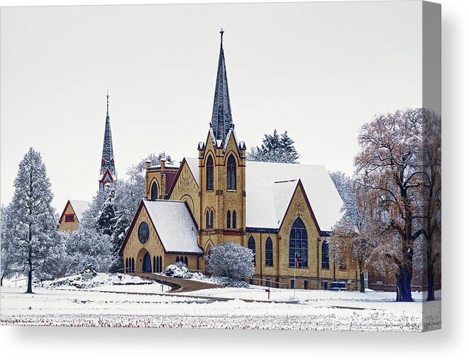 Koshkonong Canvas Print featuring the photograph East Koshkonong Norwegian Lutheran Churches viewed from the south east in wintertime by Peter Herman