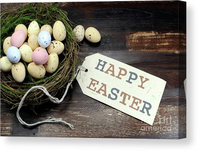 Easter Canvas Print featuring the photograph Easter candy easter eggs in birds nest by Milleflore Images