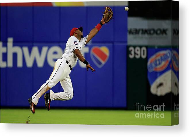 People Canvas Print featuring the photograph Elvis Andrus and Manny Machado by Ron Jenkins