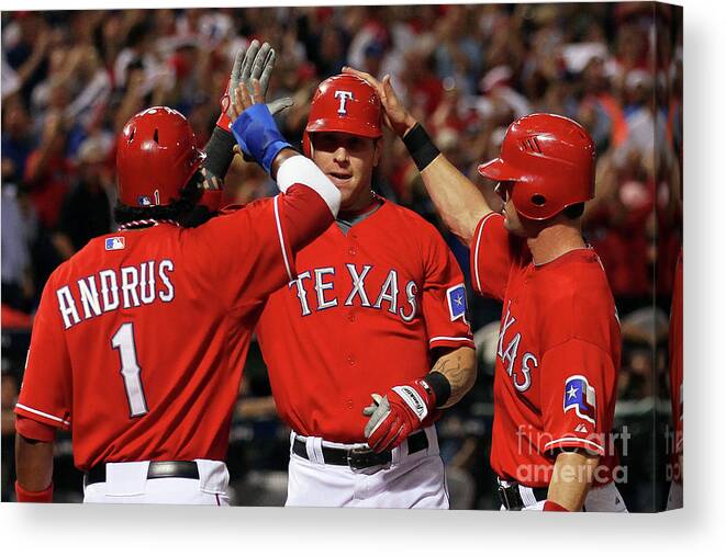 Playoffs Canvas Print featuring the photograph Elvis Andrus, Michael Young, and Josh Hamilton by Stephen Dunn