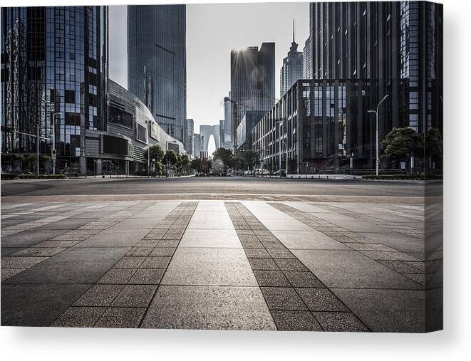 Corporate Business Canvas Print featuring the photograph Empty Pavement With Modern Architecture by Aaaaimages