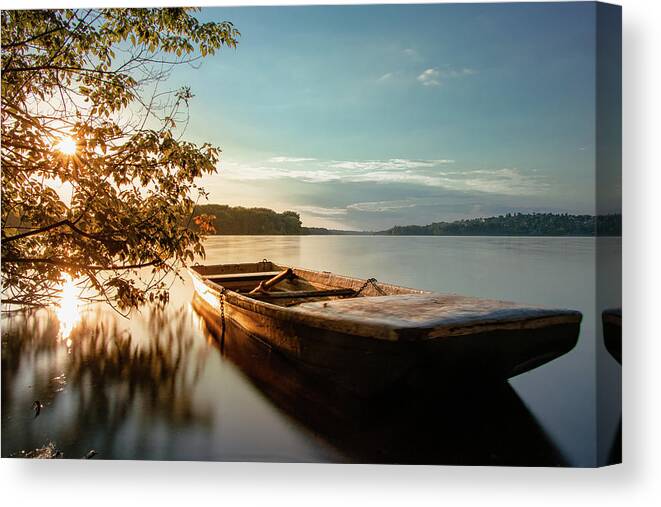 Rowboat Canvas Print featuring the photograph Fairy-tale boat moored on the shore by Vaclav Sonnek