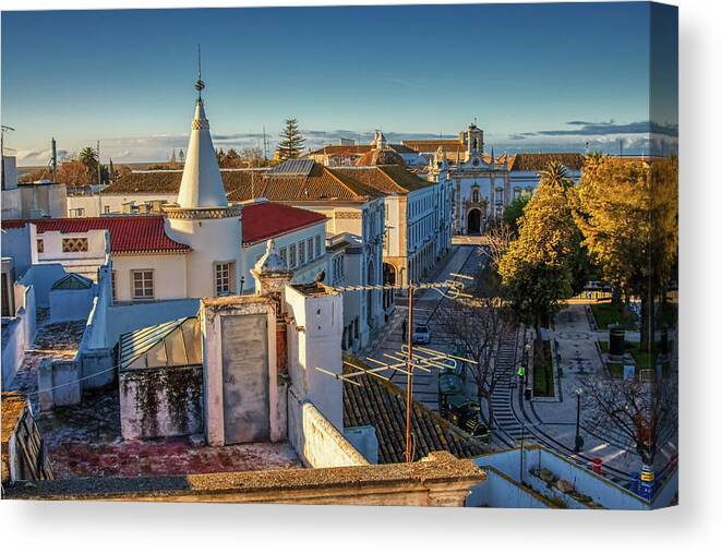 Faro Portugal Canvas Print featuring the photograph Faro Portugal rooftops in the morning light by Tatiana Travelways
