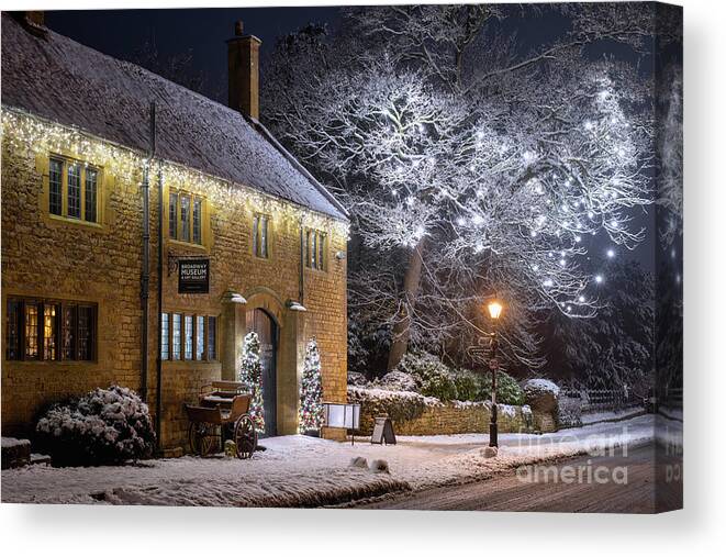 Broadway Canvas Print featuring the photograph Festive Snowy Broadway Village at Night by Tim Gainey