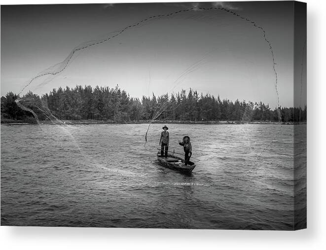 Ancient Canvas Print featuring the photograph Fishermen Casting Net by Arj Munoz