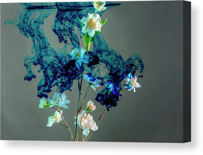 Floating Canvas Print featuring the photograph Floating blue cloud surrounding flowers by Dan Friend