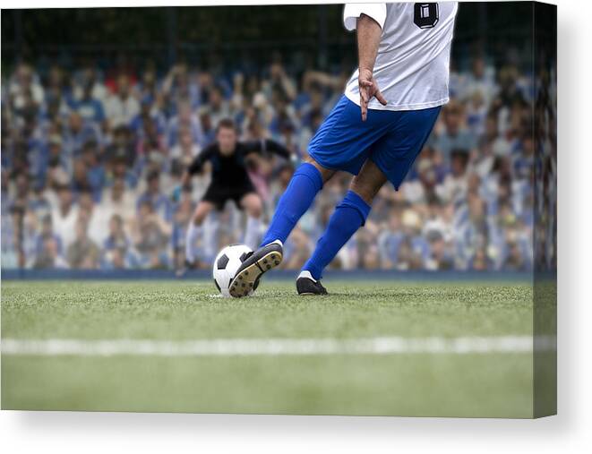 Soccer Uniform Canvas Print featuring the photograph Football Payer Shooting Penalty by Photo and Co