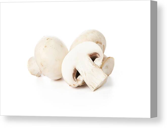 White Background Canvas Print featuring the photograph Fresh mushrooms by Nastco