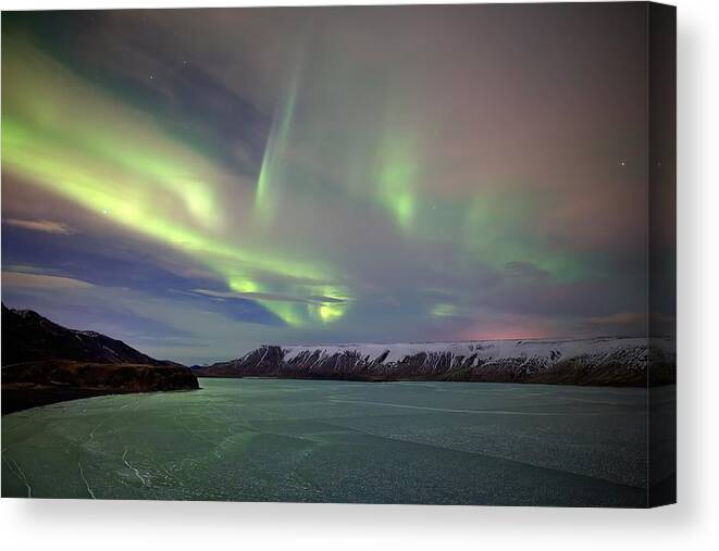 Iceland Canvas Print featuring the photograph Frozen fires by Christopher Mathews