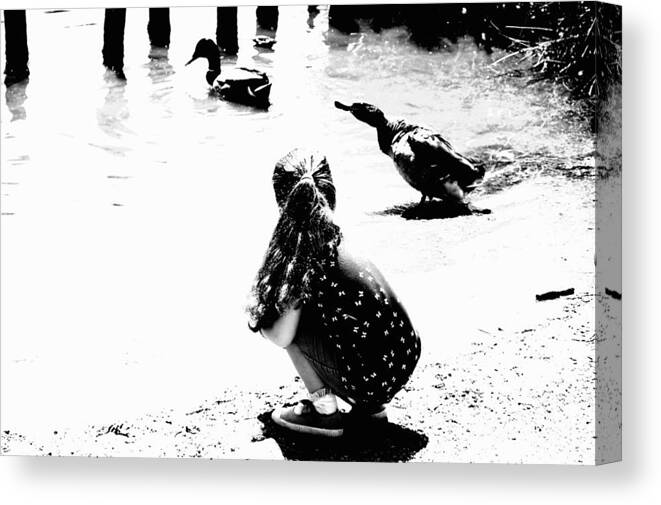 Girl Canvas Print featuring the photograph Girl Feeding The Ducks BW by Lynne Iddon