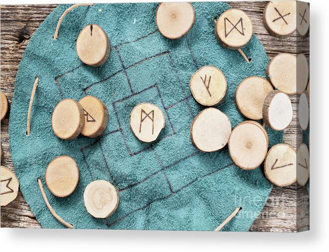 Runes Canvas Print featuring the photograph Handmade runes for fortunetelling by Anastasy Yarmolovich